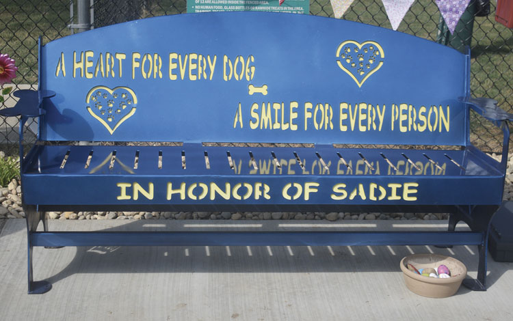 Bench at dog park dedicated in Tull's memory